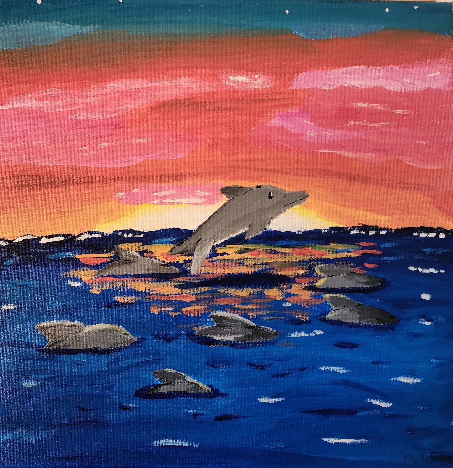 Dolphins at Sunset