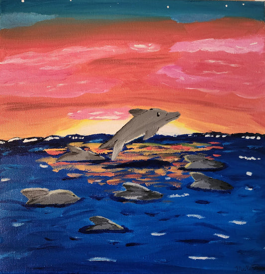Dolphins at Sunset